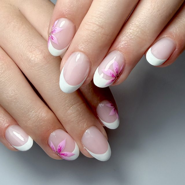 Soft French with hand-painted blossom by The Nail Editor