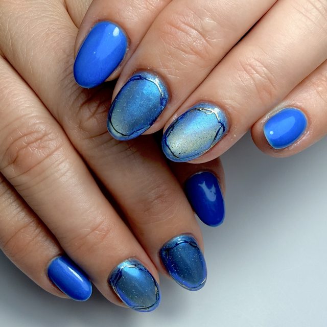 Blue marble and foil nail art by The Nail Editor