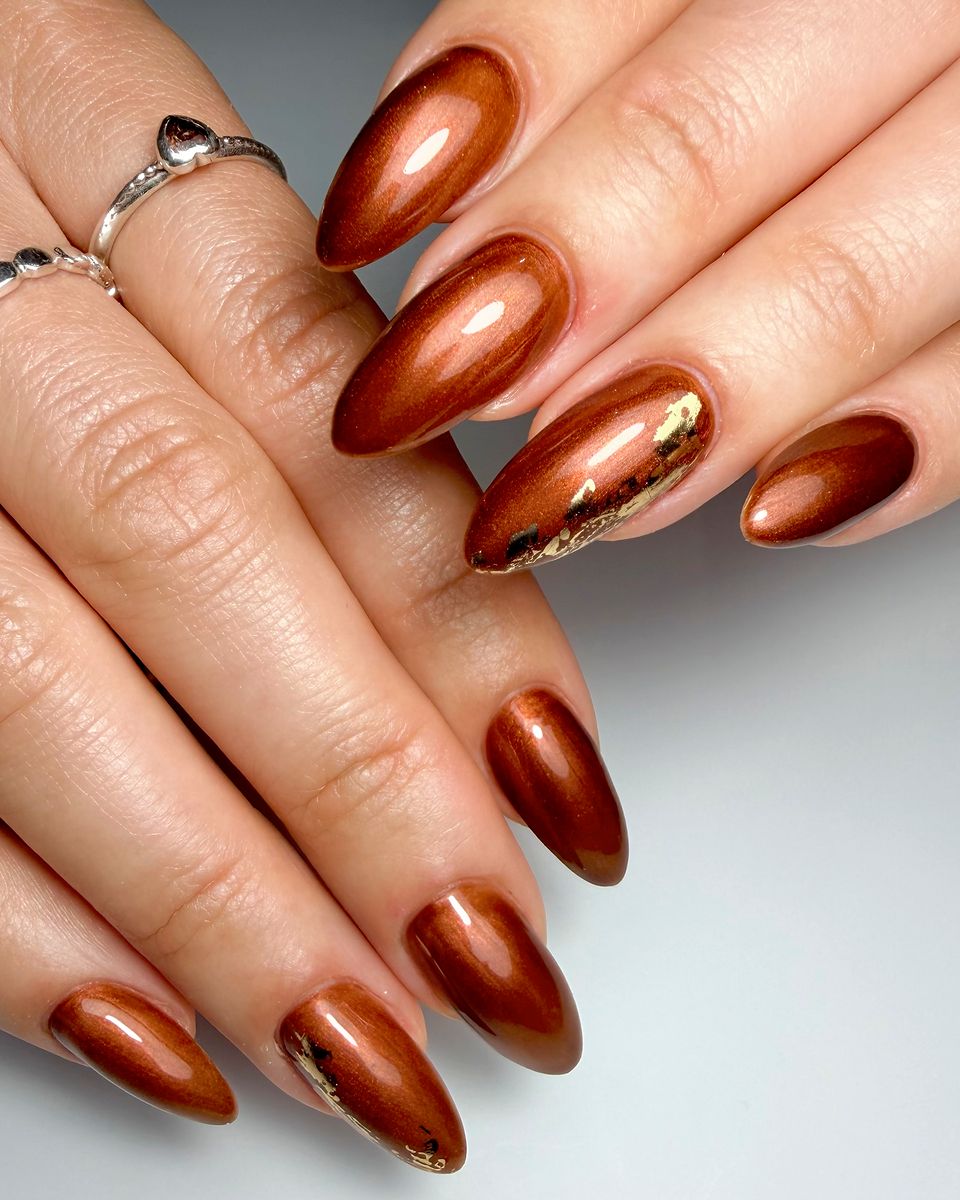 Bronze chrome almond nails by The Nail Editor