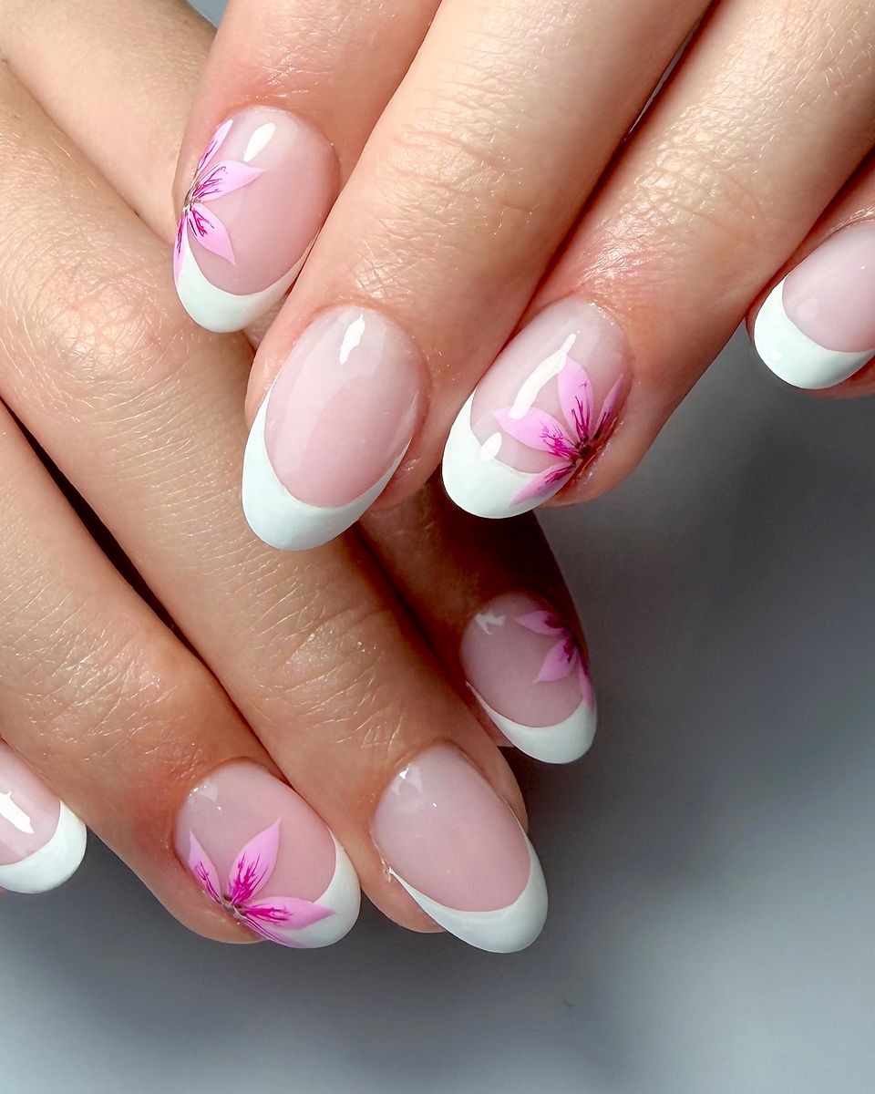 Soft French with hand-painted blossom by The Nail Editor