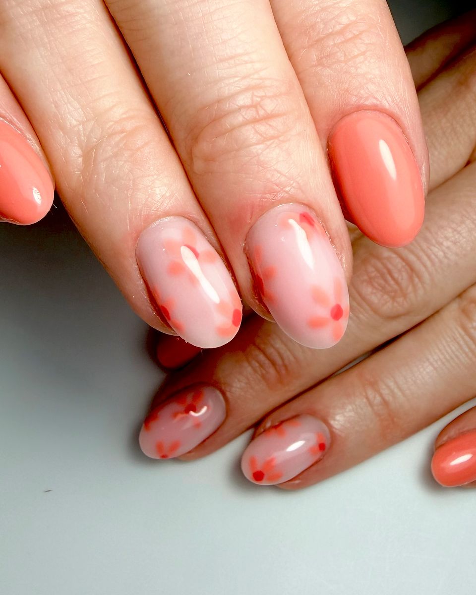 Peach and coral nails with soft blossom nail art by The Nail Editor