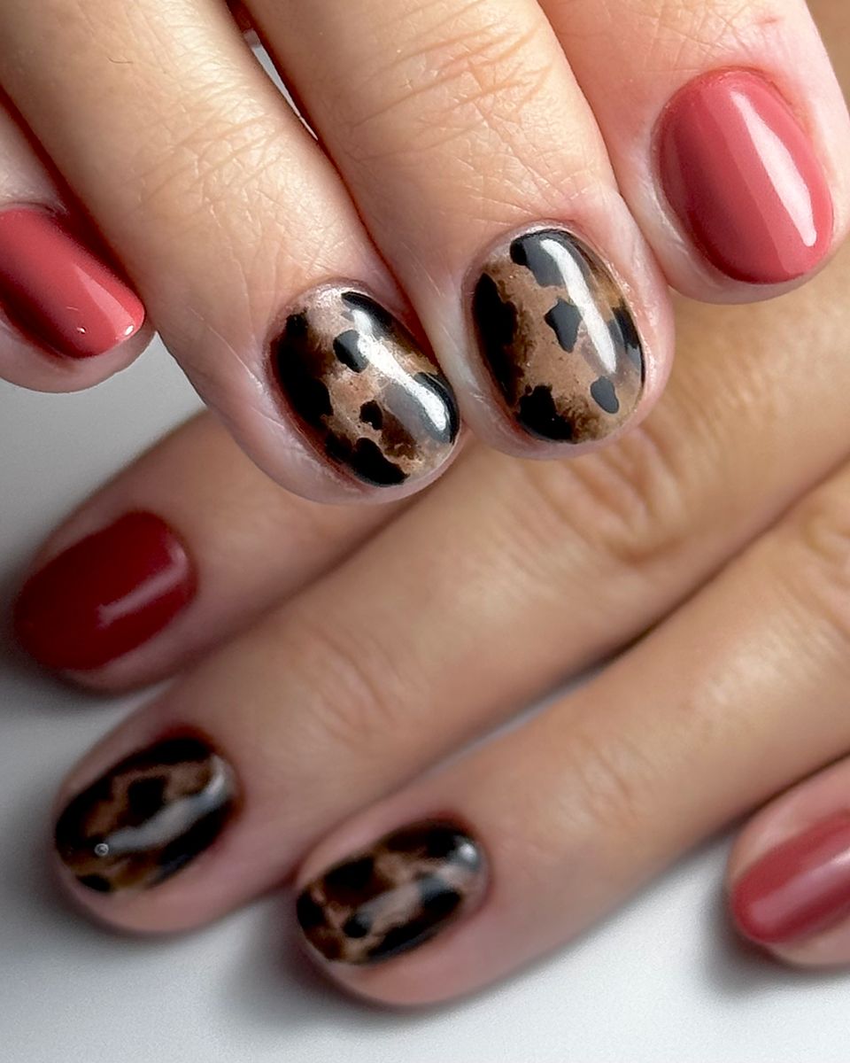 Coral nails with black and white leopard accents by The Nail Editor