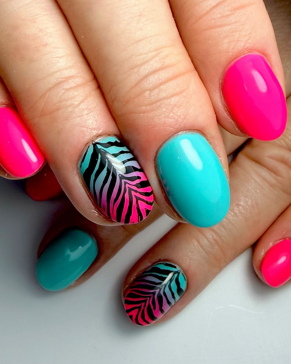 Teal and pink tropical leaf nail art by The Nail Editor