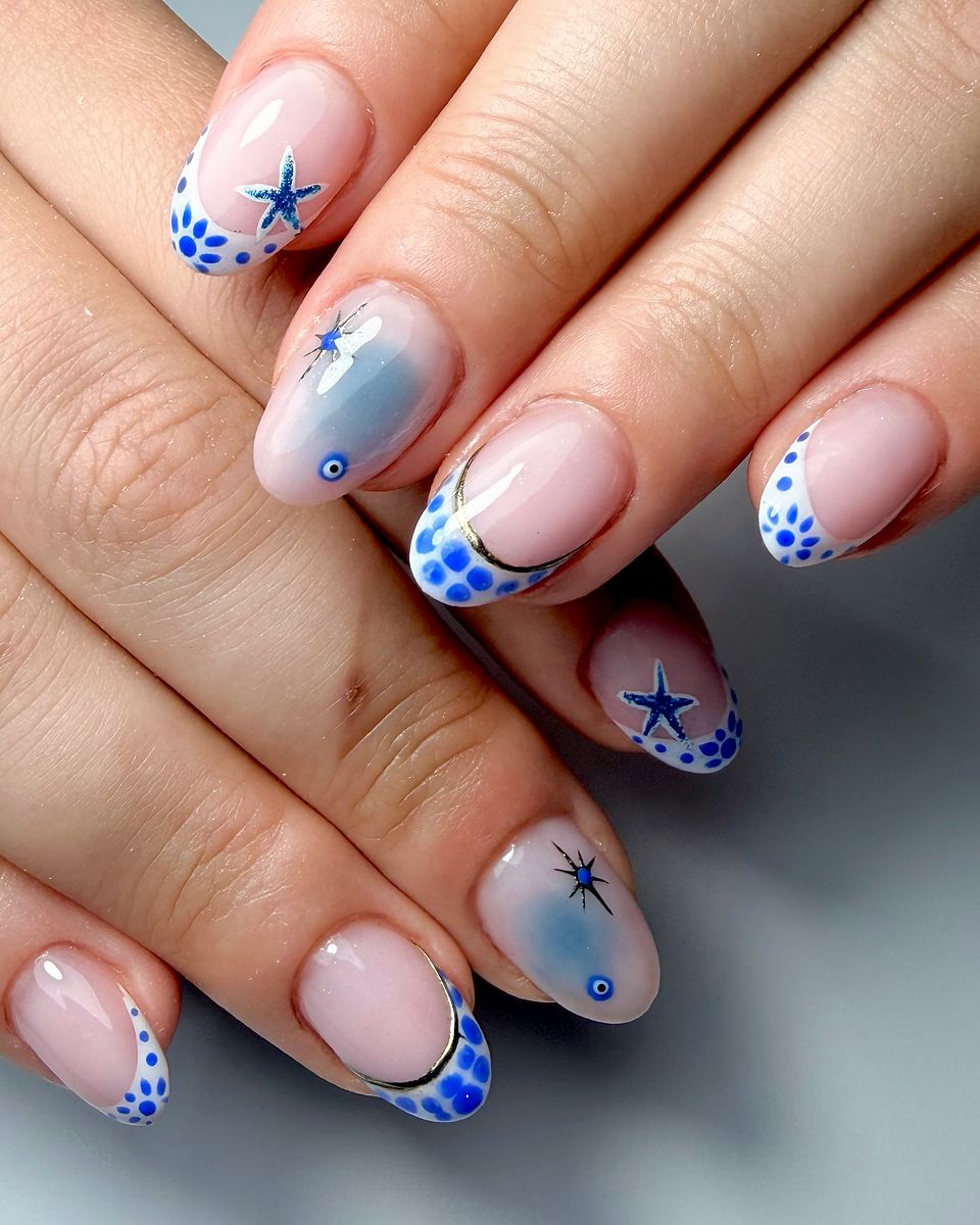 Blue and white florals with star accents by The Nail Editor