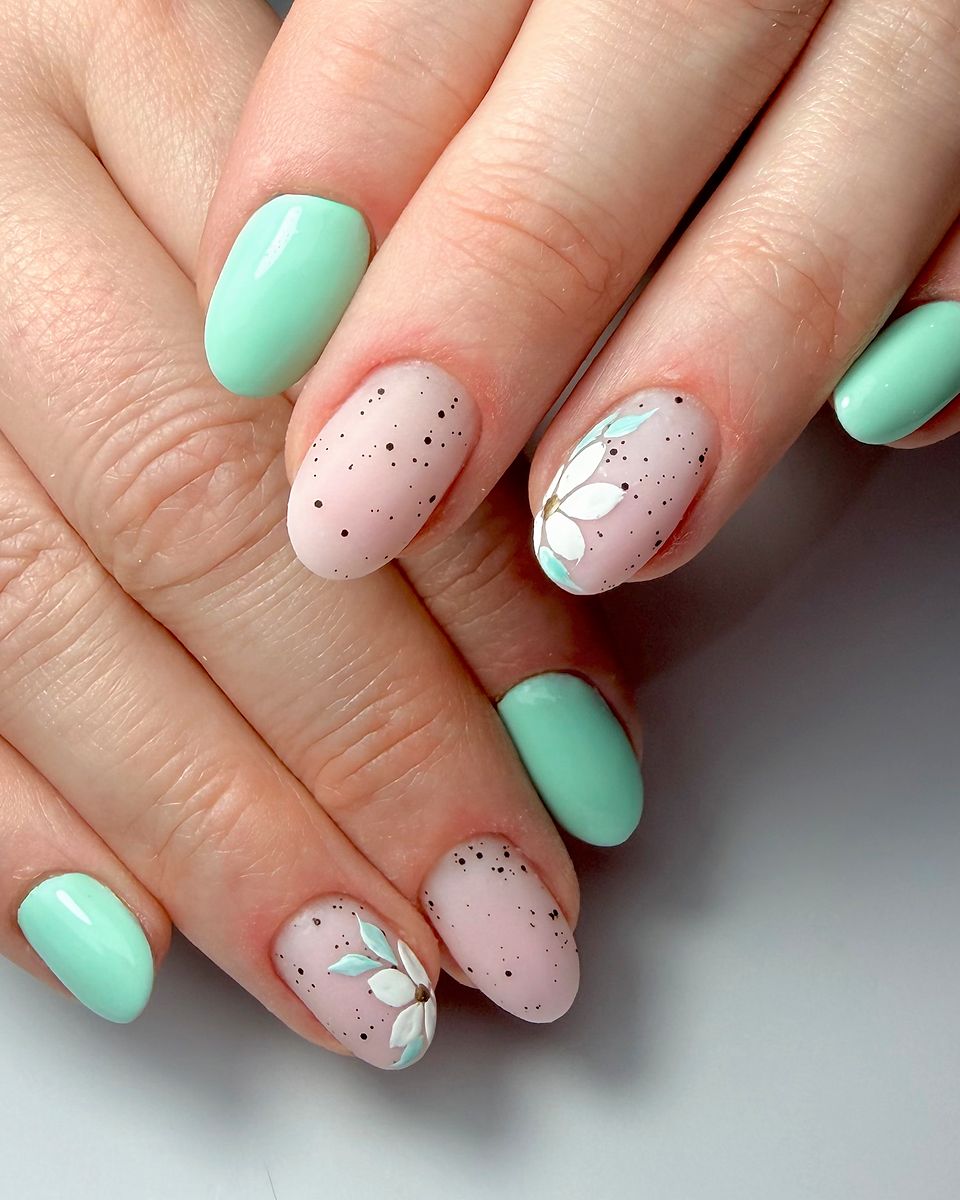 Mint and white blooms on a soft base by The Nail Editor