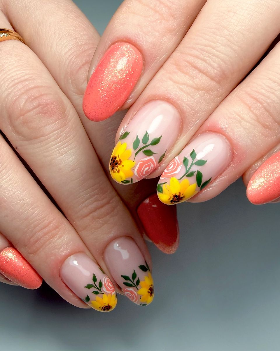 Coral nails with yellow flowers by The Nail Editor