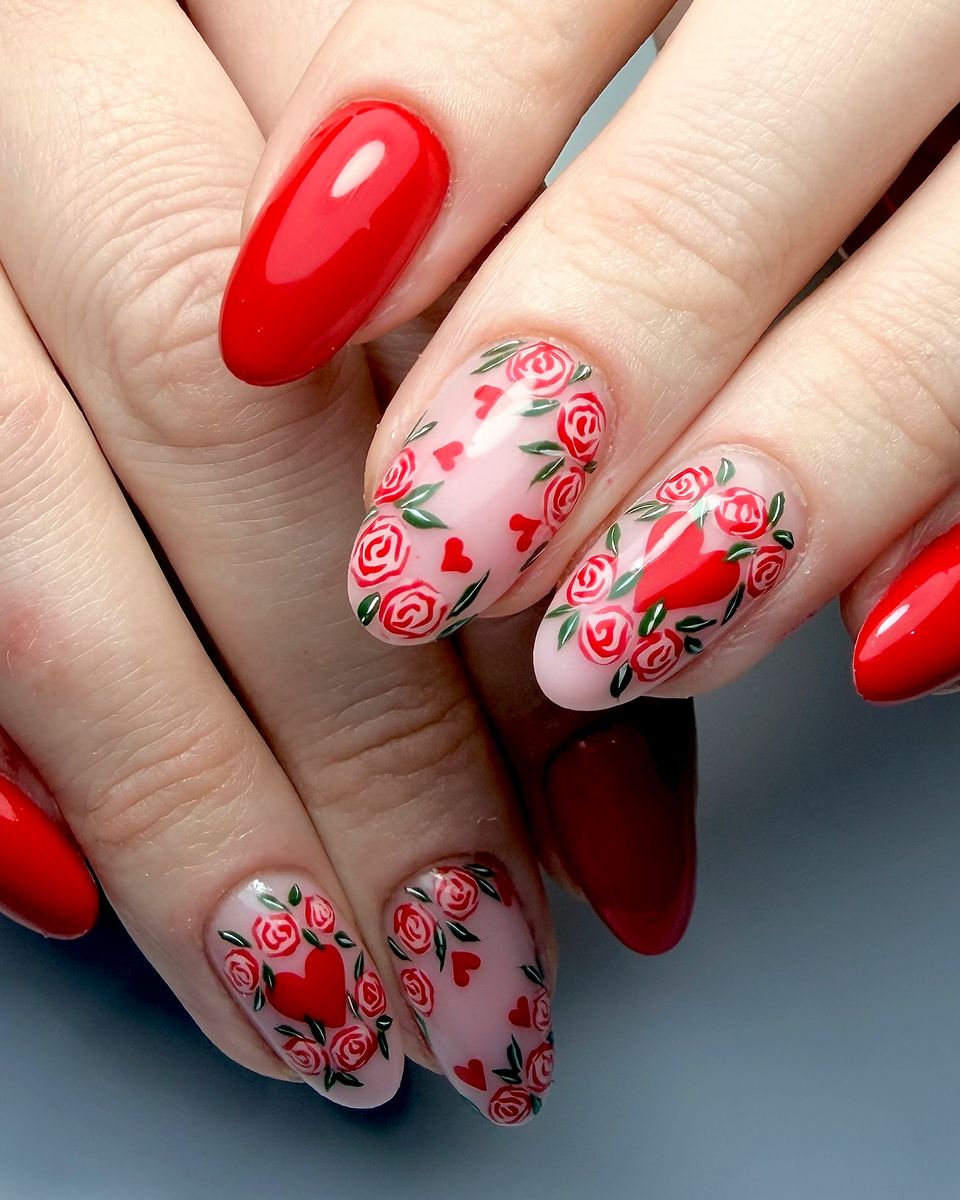 Red nails with delicate florals by The Nail Editor