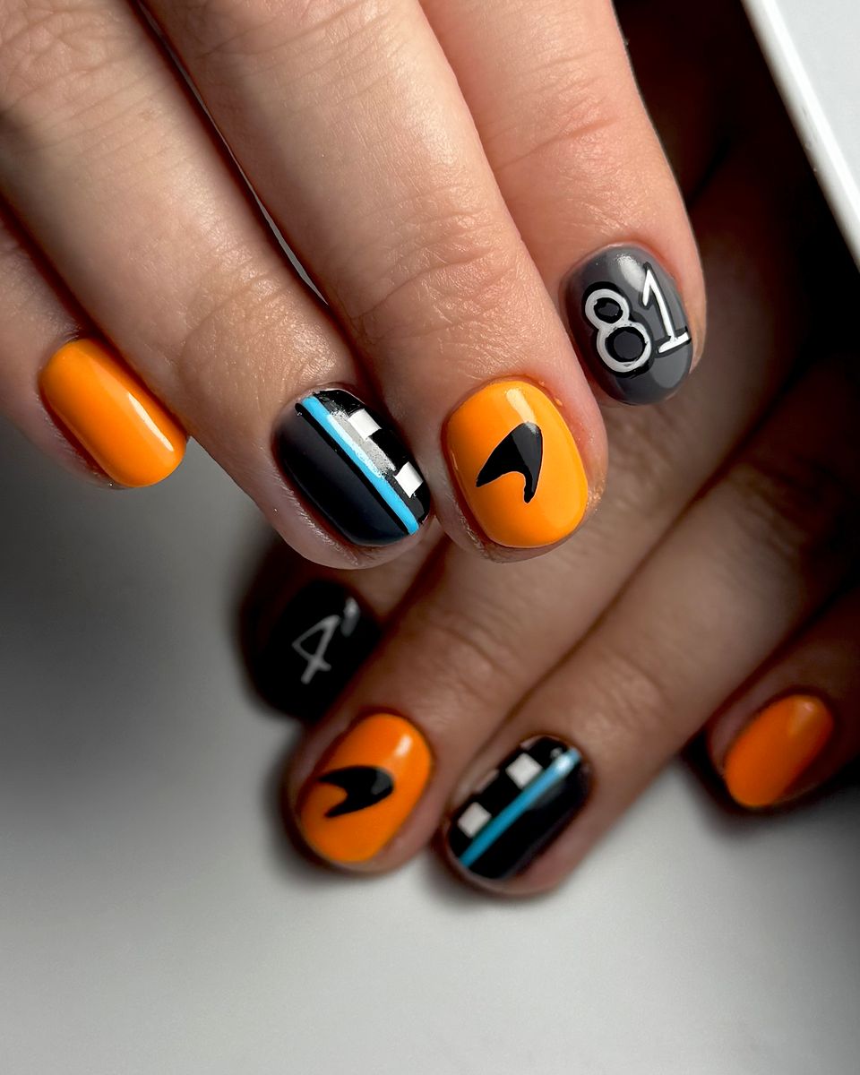 McLaren Formula 1 inspired nail art in papaya and black by The Nail Editor