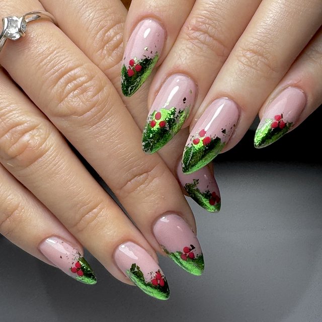 Green foil tips with holly berries by The Nail Editor