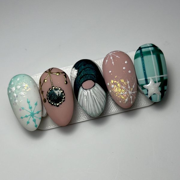 Winter tips: snowflakes, a bauble, a Christmas gnome and frosted tartan by The Nail Editor